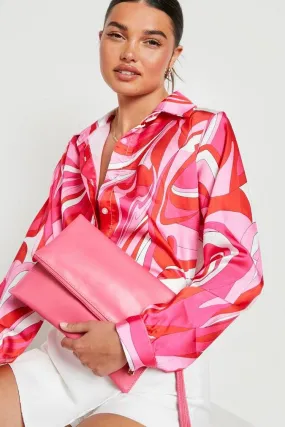 Folded oversized clutch in pink