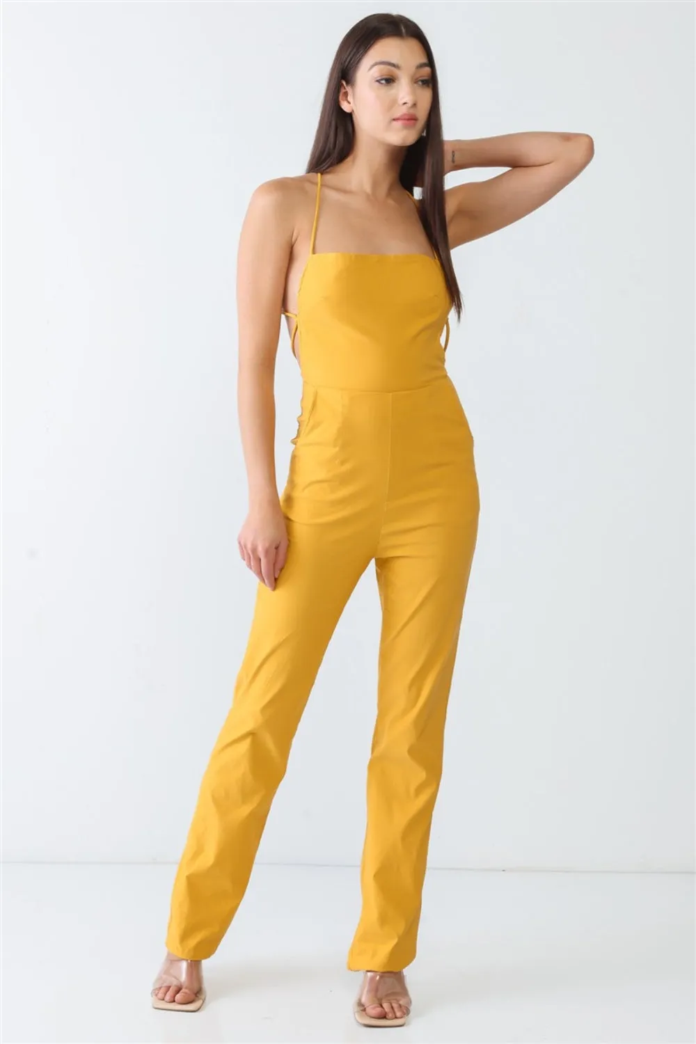 Sunset and Swim – Doreli Group – Rückenfreier, ärmelloser Jumpsuit mit Spaghettiträgern und Bindeband